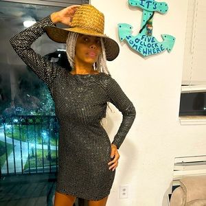 Selling this shiny dress that’s brand new with tags. New Years dress